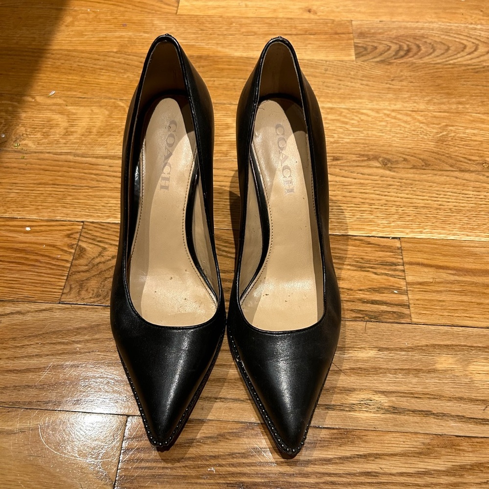 Black Coach leather studded pump heels